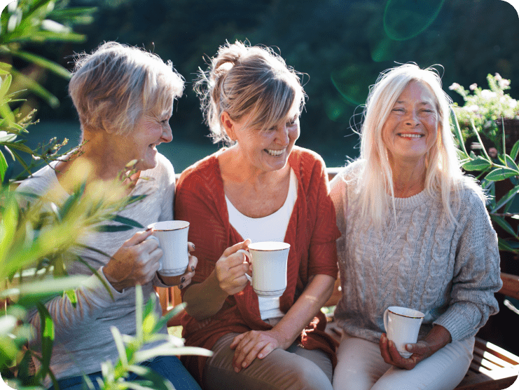 Home_Everything_You Three women smiling after talking with their dentist.