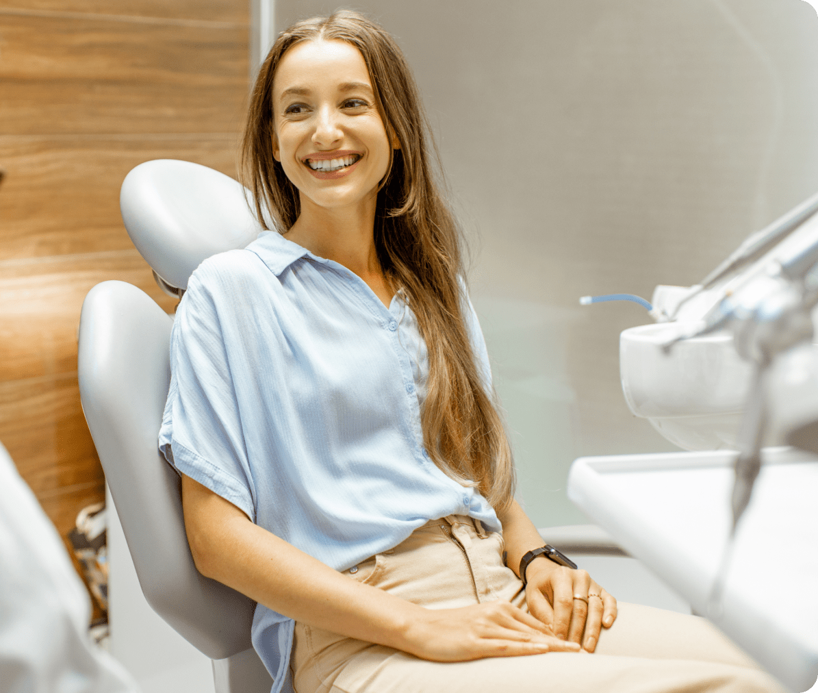 woman patient waiting in dental chair in Mesquite, TX